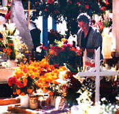 woman tending a gravesite