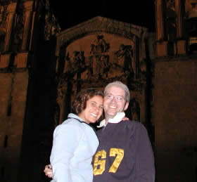 annette and tim in from of an old dark church (not in Peru however)
